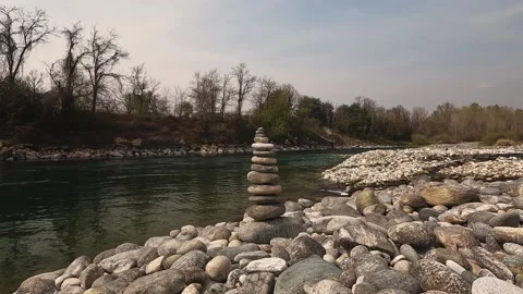 Stone balance by the river Stock Footage 200829538