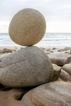 Stone balancing on stone Stock Photos