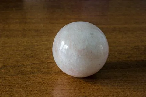 Stone ball on the table Stock Photos