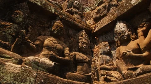 Stone bas-reliefs on the wall of an ancient temple Video stock 49407902