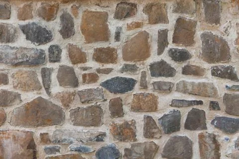 Stone (basalt) wall - background texture. Stock Photos