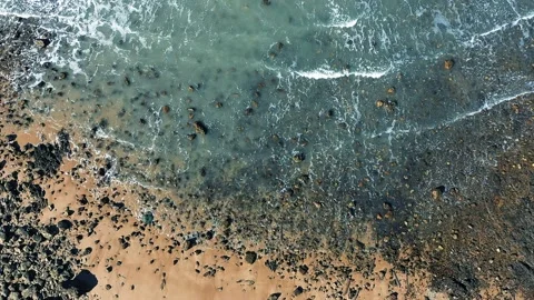 Stone beach and waves aerial shot. Stock-Footage 171868417