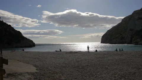 Stone Beach between Two Mountains Stock Footage 148748470