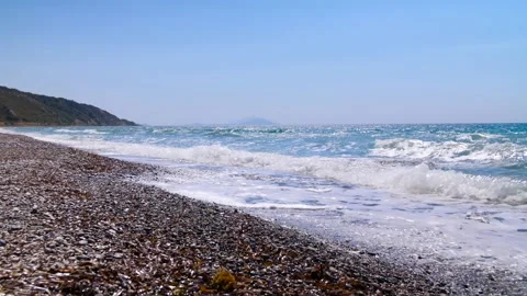 Stone Beach with blue Waves Stock Footage 158144735