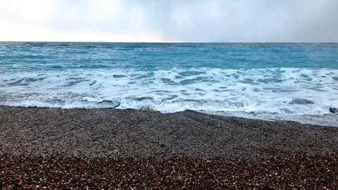 Stone beach with cloudy sky Stock Footage 90554492