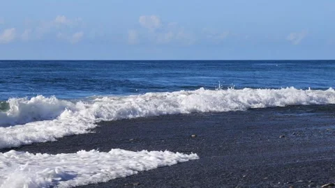 In stone beach in front of the eyes, the continuous rolling wave. Stock Footage 277962962