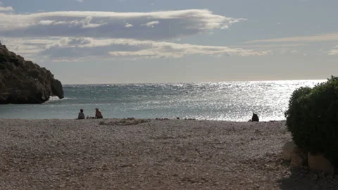 Stone Beach next to a Mountain Stock Footage 148748641