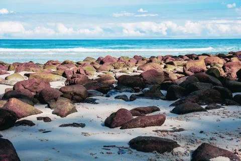Stone on beach with the sky. 스톡 사진