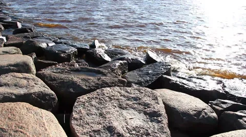 Stone beach, the surf. Video stock 36211703
