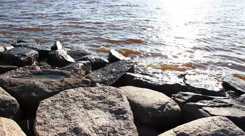 Stone beach, the surf. Video stock 36211996