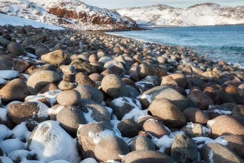 Stone beach in Teriberka Stock Photos
