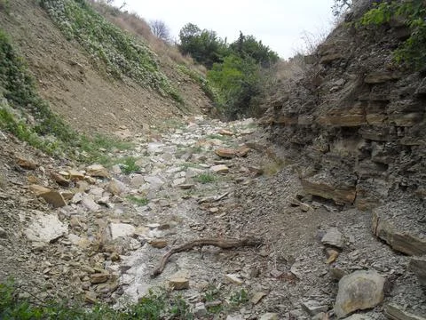Stone bed of a dried up small river Stock Photos