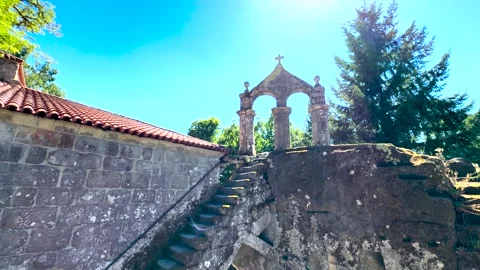 Stone Belfry and Monastery Wall at San Pedro de Rocas in Esgos Video stock 342800645