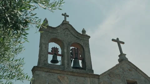Stone Bell Gable With Two Bells and Crosses on Rural Church Stockbeeldmateriaal 348192583