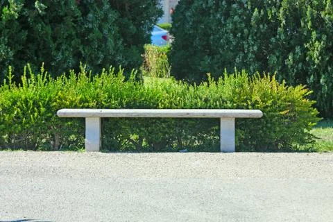 Stone bench in park Stock Photos