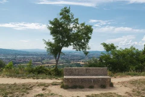 Stone bench on the top of a mountain Stock Photos