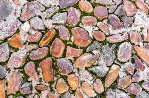 Stone block with grass - seamless background. Stock Photos