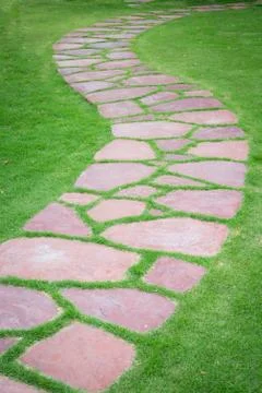 The Stone block walk path in the park Stock Photos