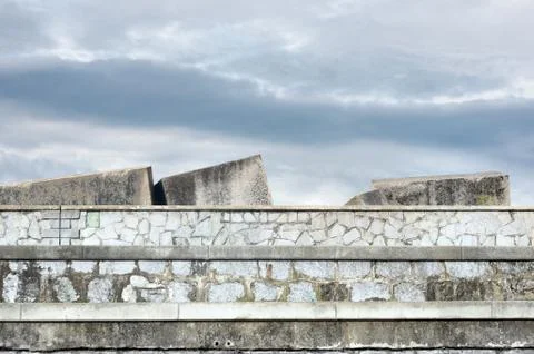 Stone blocks in dock to protect against sea Stock Photos