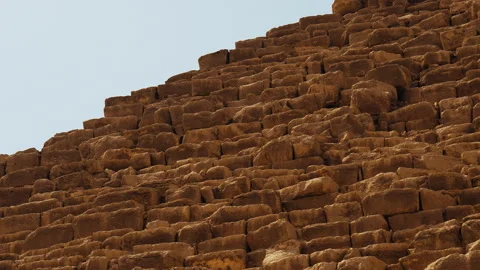Stone Blocks of the Pyramids of Giza Under Clear Desert Sky 스톡 동영상 328154876