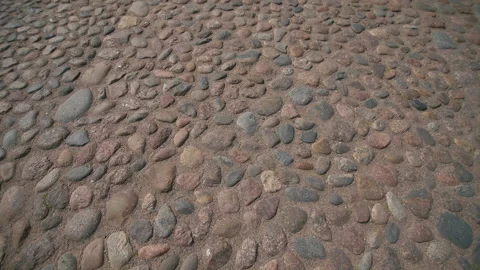 Stone blocks in the walkway. Old stone bridge road Stock Footage 197742103