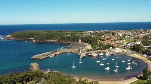Stone breakwall guarding Ulladulla town harbour on Pacific South coast 4k. Stock Footage 183607922
