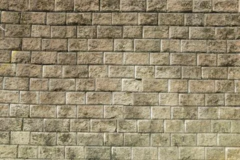 Stone brick wall with  weathered cement  background Stock Photos