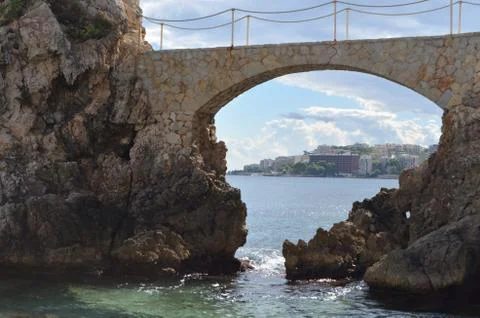 Stone Bridge of Cala Major Beach with a View of City Palma de Mallorca, Spain Stock Photos