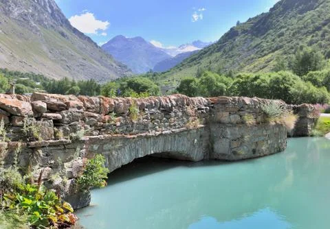 Stone bridge cross a river Stock Photos