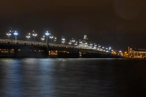 Stone Bridge over Daugava River in Riga Latvia at Night 写真素材