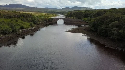 Stone bridge over a river 스톡 동영상 111655434