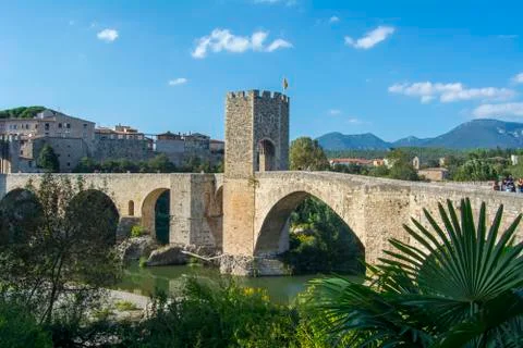 Stone bridge over river Stock Photos