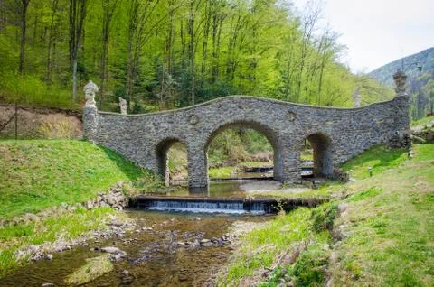 Stone bridge over a small river. Voevodyno resort. beautiful landscape in the Stock Photos