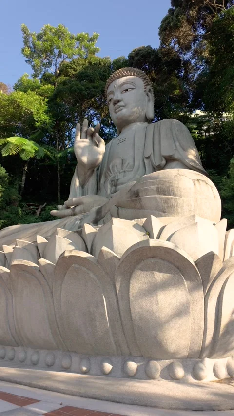 Stone Buddha statue at Chin Swee Caves Temple in Genting Highlands Stock Footage 338003806