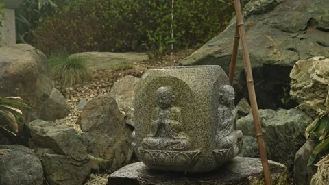 Stone Buddha Statue In Garden 動画素材 335950816