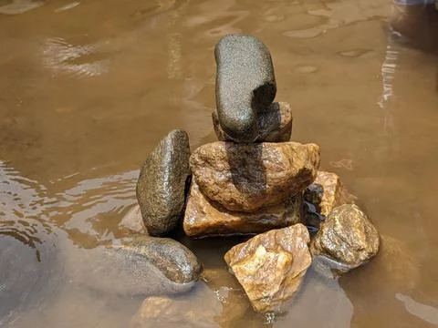 Stone building in the river Stock Photos
