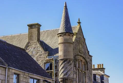 Stone building with a round tower Stock Photos