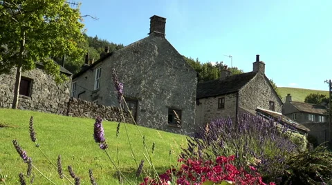 Stone buildings (right-left pan), Castleton, Peak District. Video stock 53403604