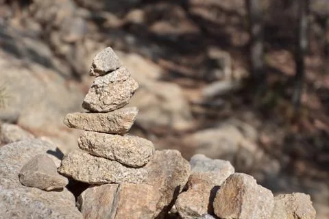 Stone cairn on a blurry background Foto stock