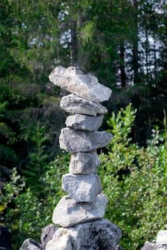 Stone cairn in the forest 写真素材