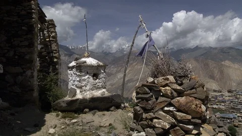 Stone cairn with a prayer flag built in the mountains of Himalaya. Medium Stock Footage 116606015