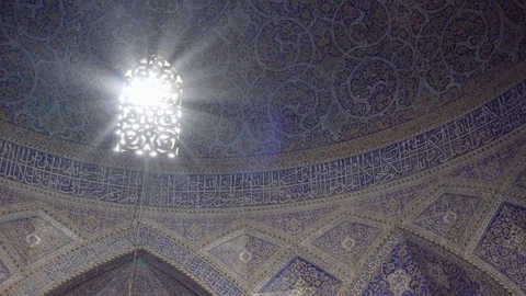 Stone carved window and play of light inside Seyyed Mosque Stock Footage 100031363