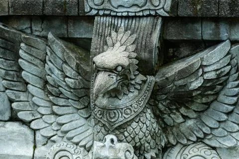 Stone carving of an eagle statue Stock Photos