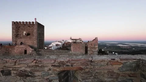 A stone castle next to a brick building Stock Footage 155589411