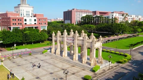 Stone ceremonial gate at Sun Yat-sen University in Guangzhou China Video stock 345960082
