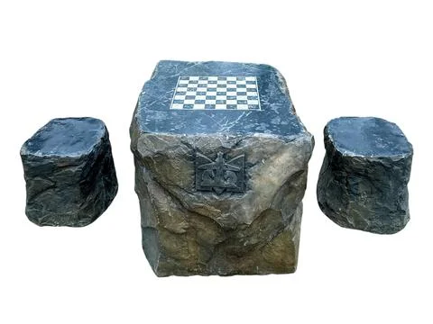 Stone chess table and seats displaying an outdoor game setting Stock Photos