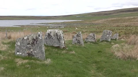 Stone circle standing stones ancient at Achavanich Stock Footage 250653552