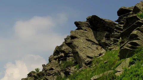 Stone cliff against the sky Stock Footage 68860163