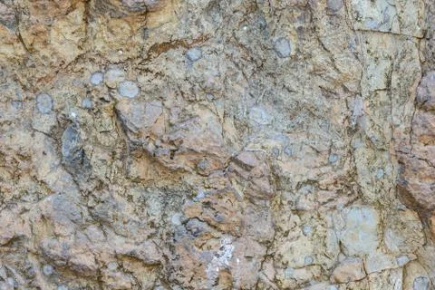 Stone cliff texture. Stock Photos