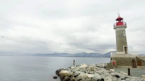 Stone coastline with lighthouse Video stock 86565625